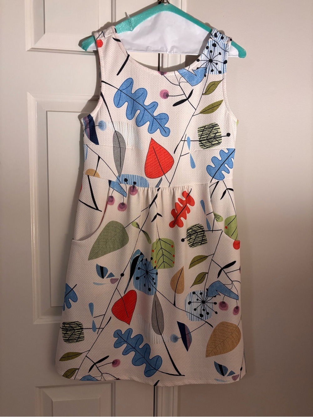 White Sleeveless Casual Dress with Colorful Leaf Print